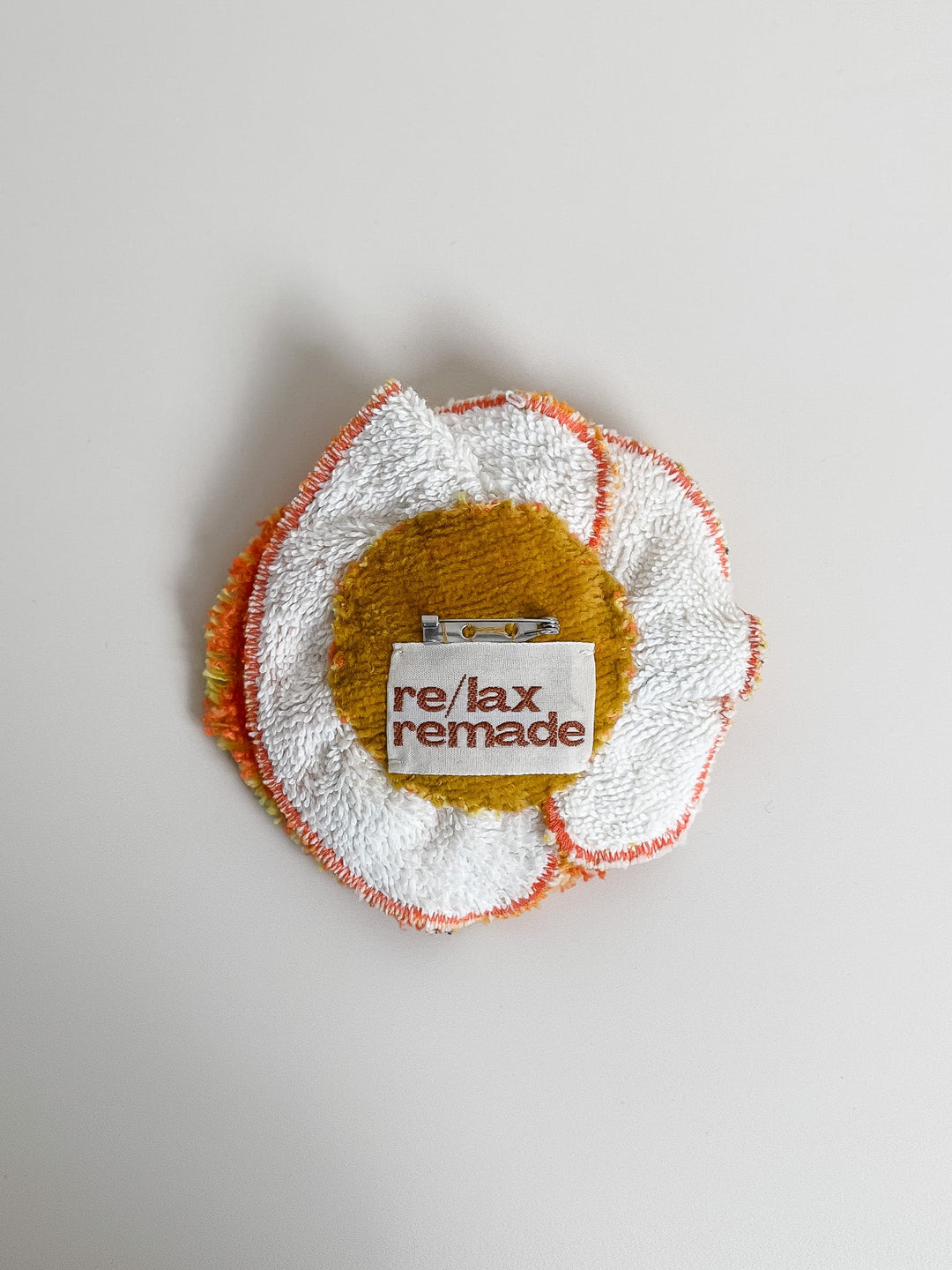 Re/lax Rosette #27 by Leigh handmade by expert artisans from upcycled vintage towels, in Sydney.